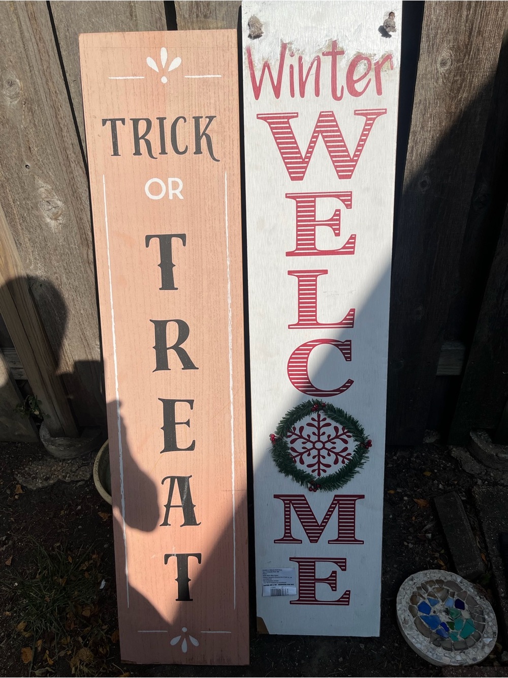 2 wooden outdoor porch signs
